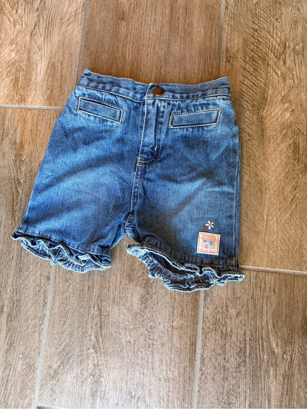 Disney Classic Pooh Girls Denim Ruffle Hem Shorts - Vintage Blue 24 months